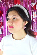 Mini Pink Marble Bow Huggie Hoop Earrings