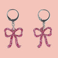 Mini Pink Glitter Bow Huggie Hoop Earrings