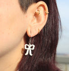 Mini White Bow Huggie Hoop Earrings