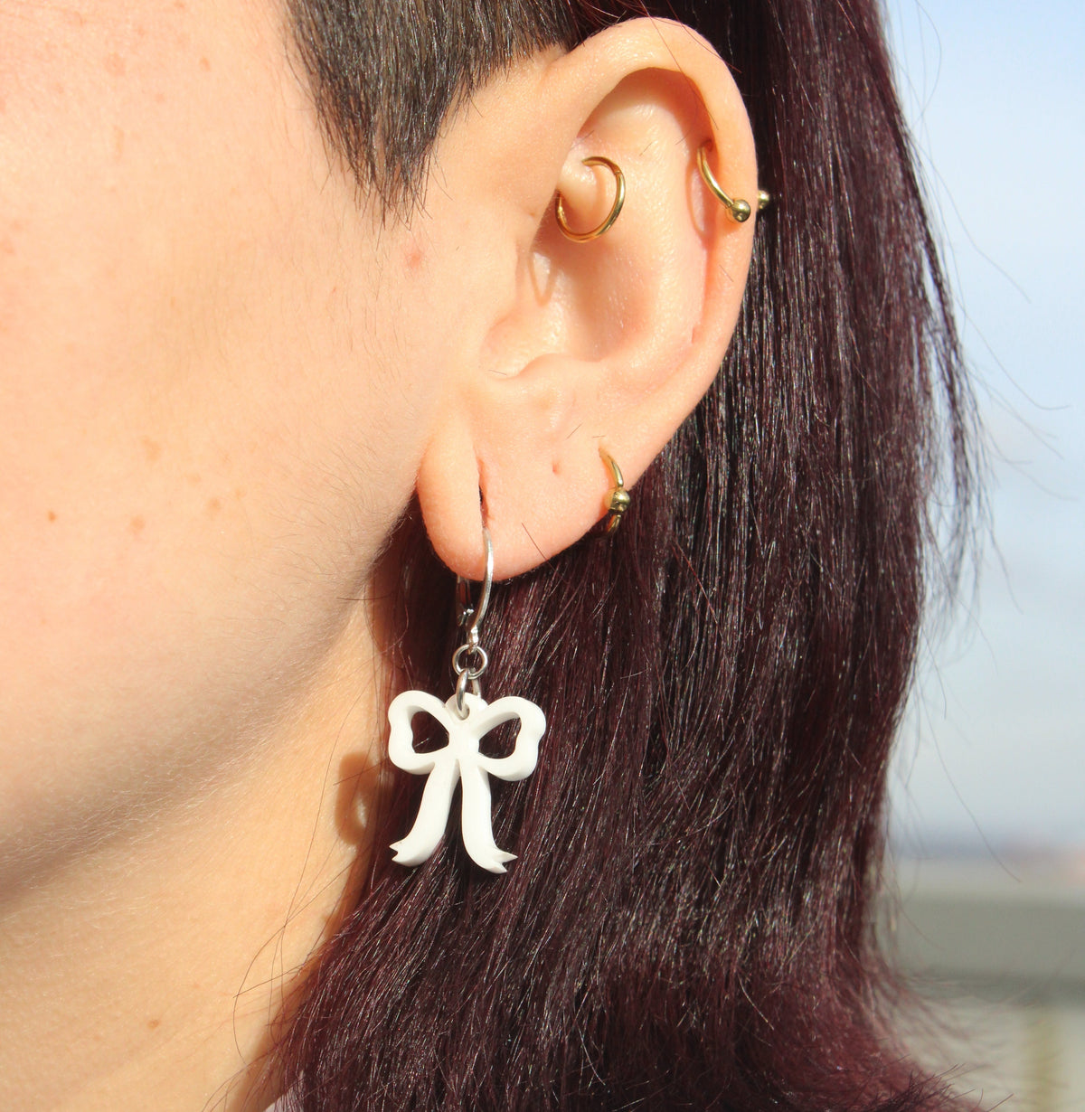 Mini White Bow Huggie Hoop Earrings